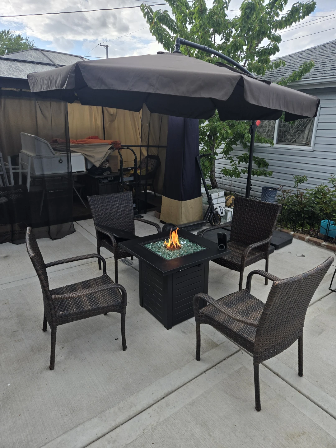 Patio Fire Pit Table with 4 Chairs and Umbrella