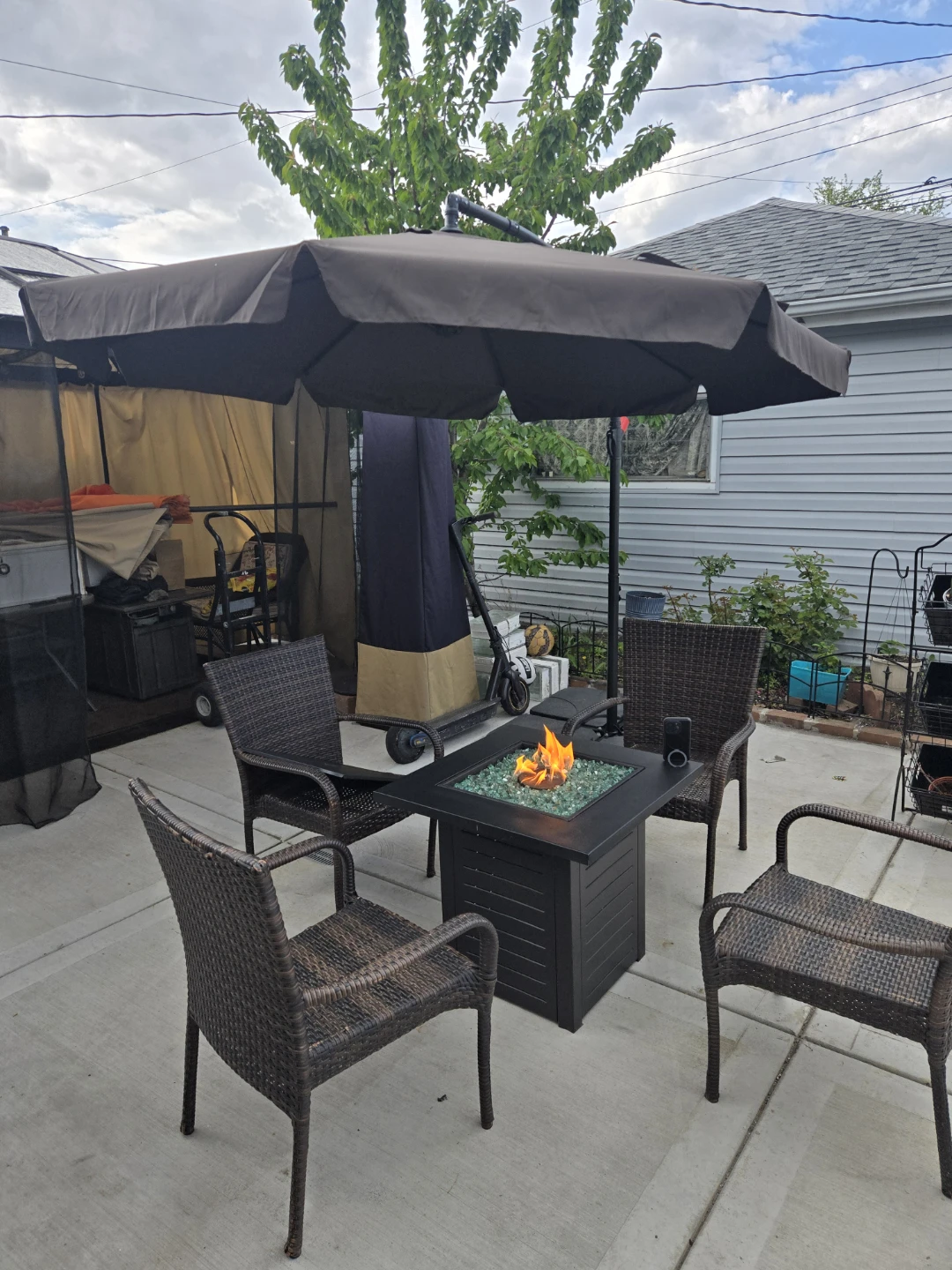Patio Fire Pit Table with 4 Chairs and Umbrella - photo 2