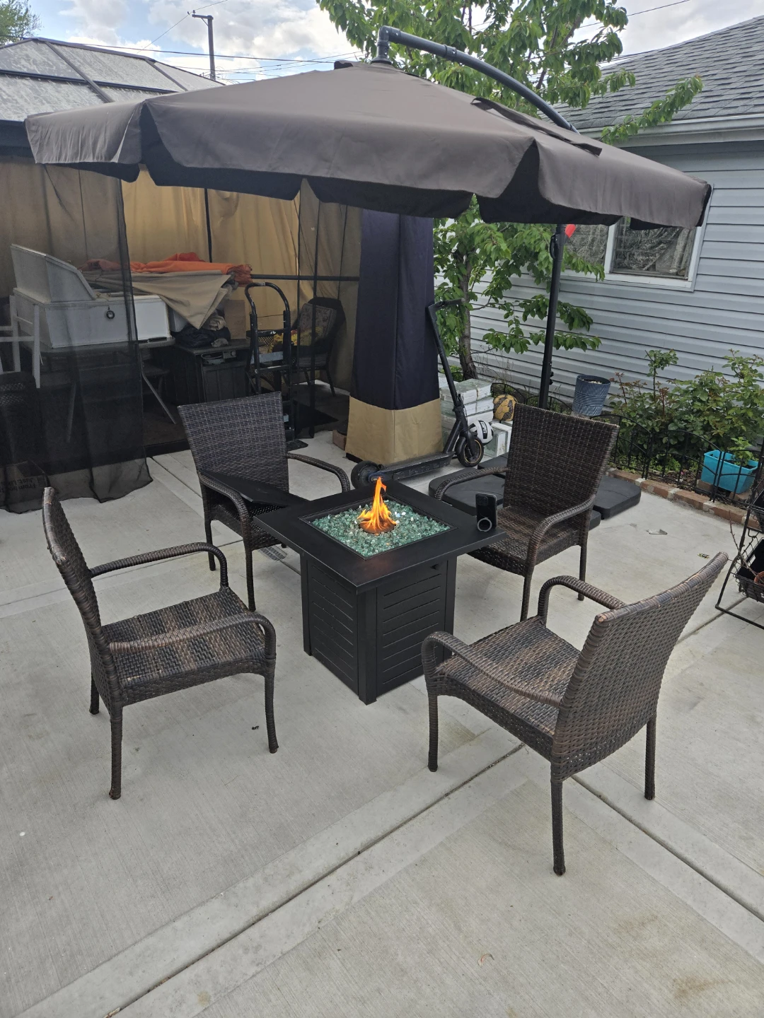 Patio Fire Pit Table with 4 Chairs and Umbrella - photo 4