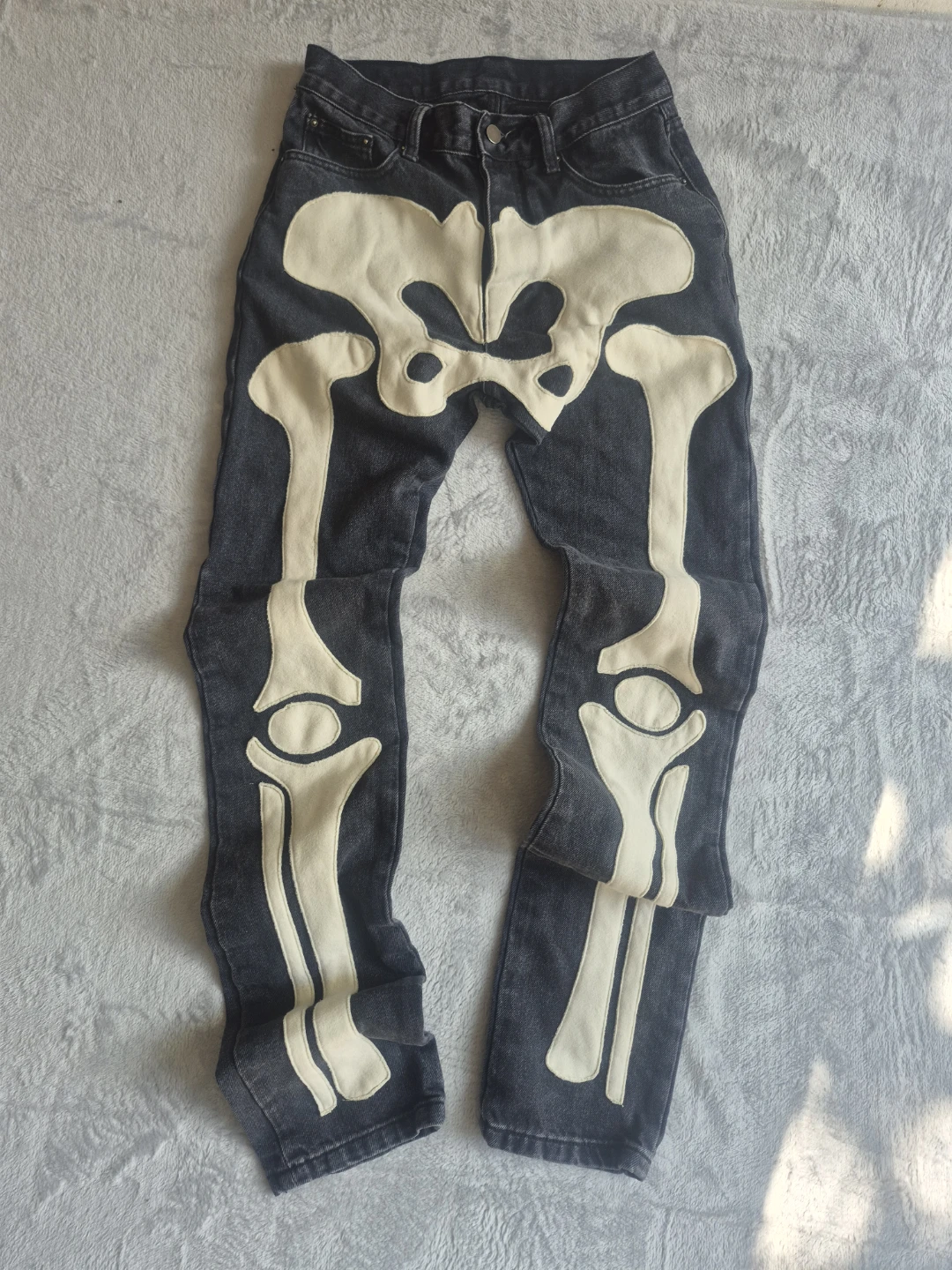 MNML D184 Skeleton Denim Pants in black and white.
