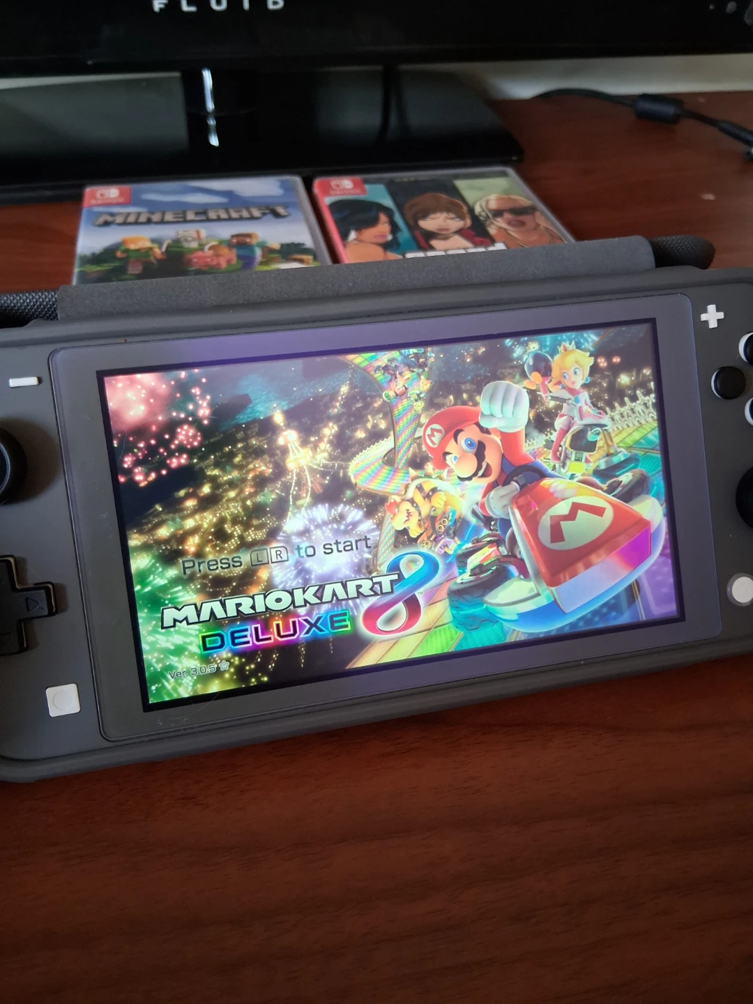 Nintendo Switch Lite with 2 Physical Games - photo 3