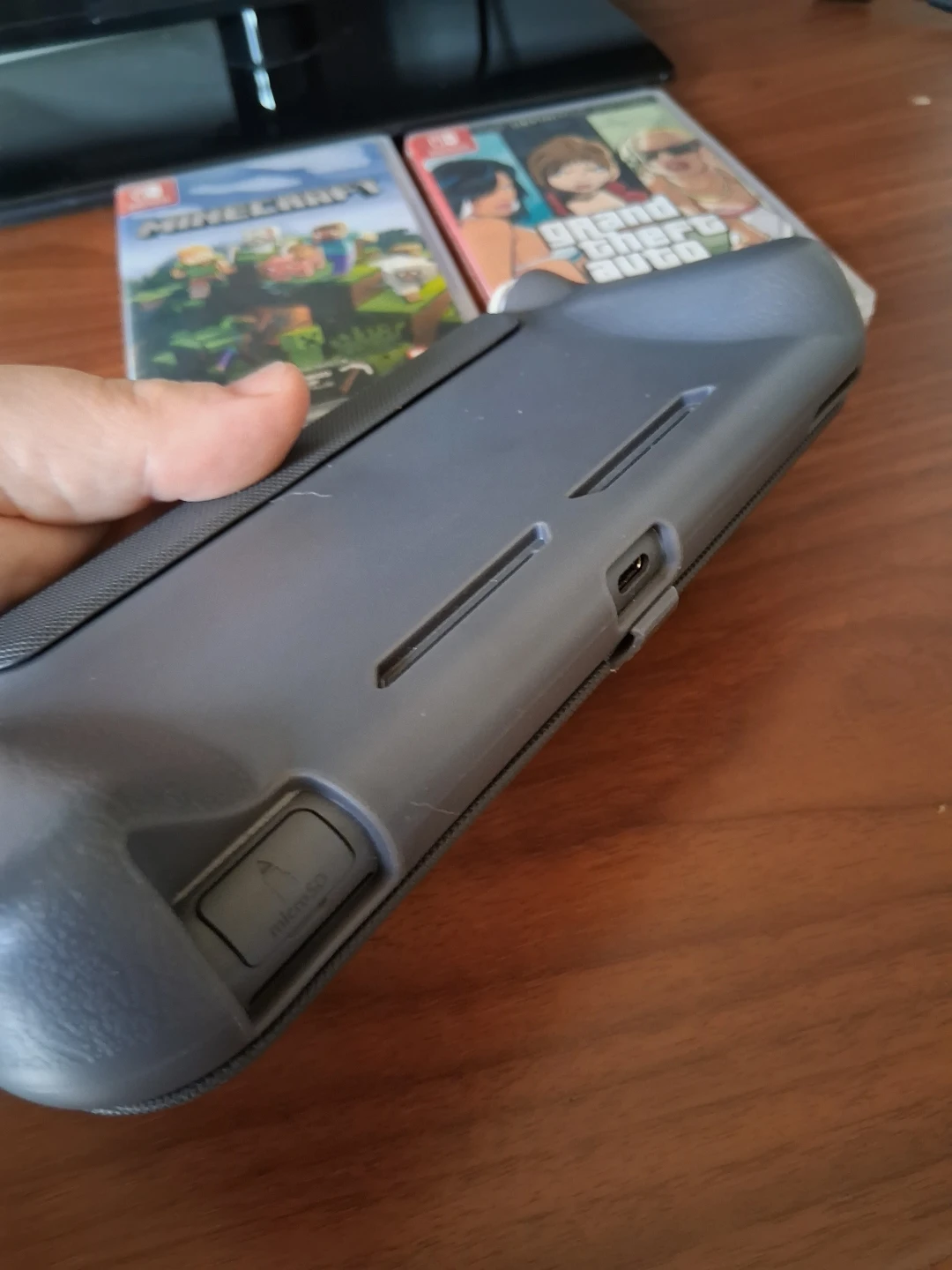Nintendo Switch Lite with 2 Physical Games - photo 4