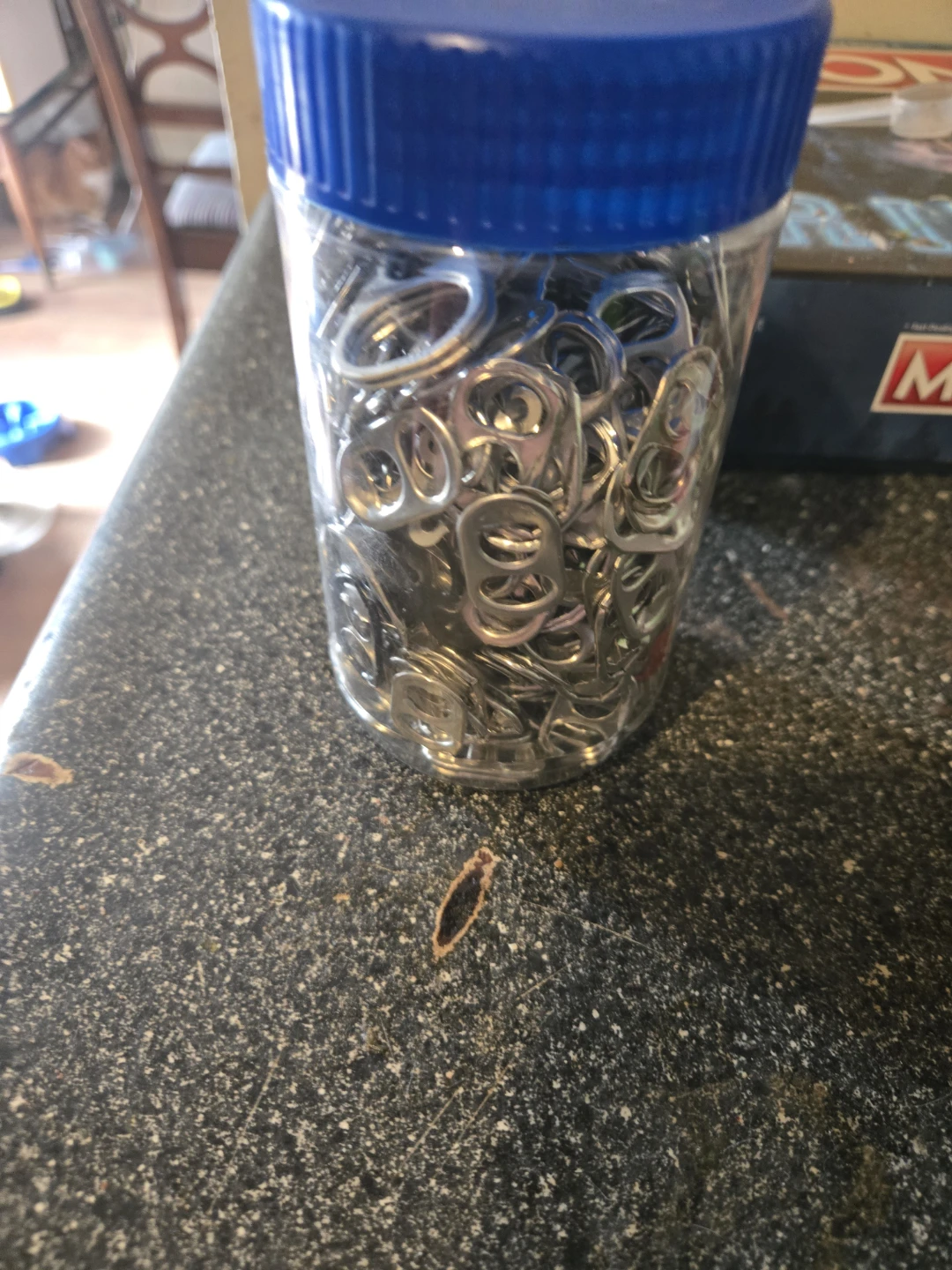 Container of Pop Tab Rings