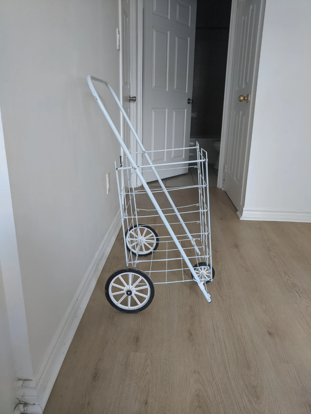 White Metal Rolling Shopping Cart