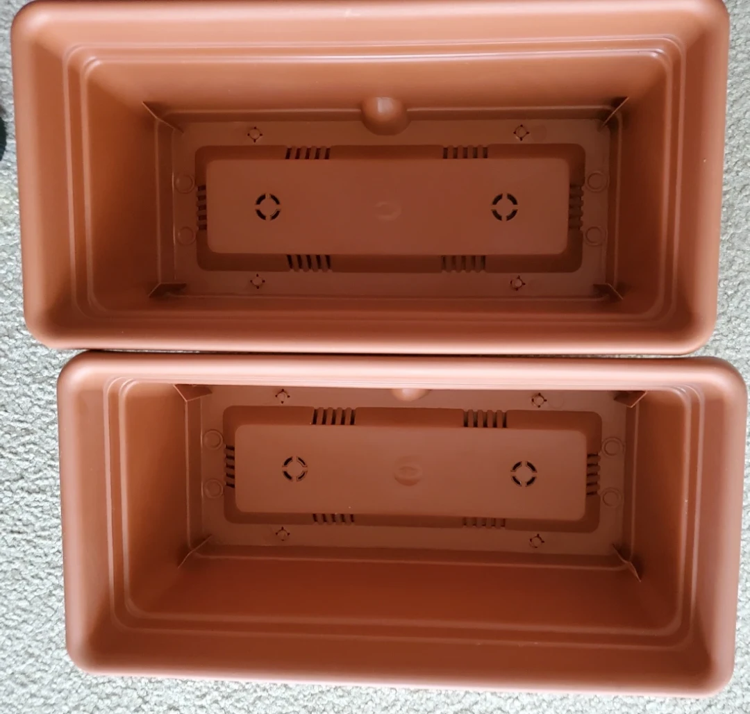 Two Brown Rectangular Planter Boxes
