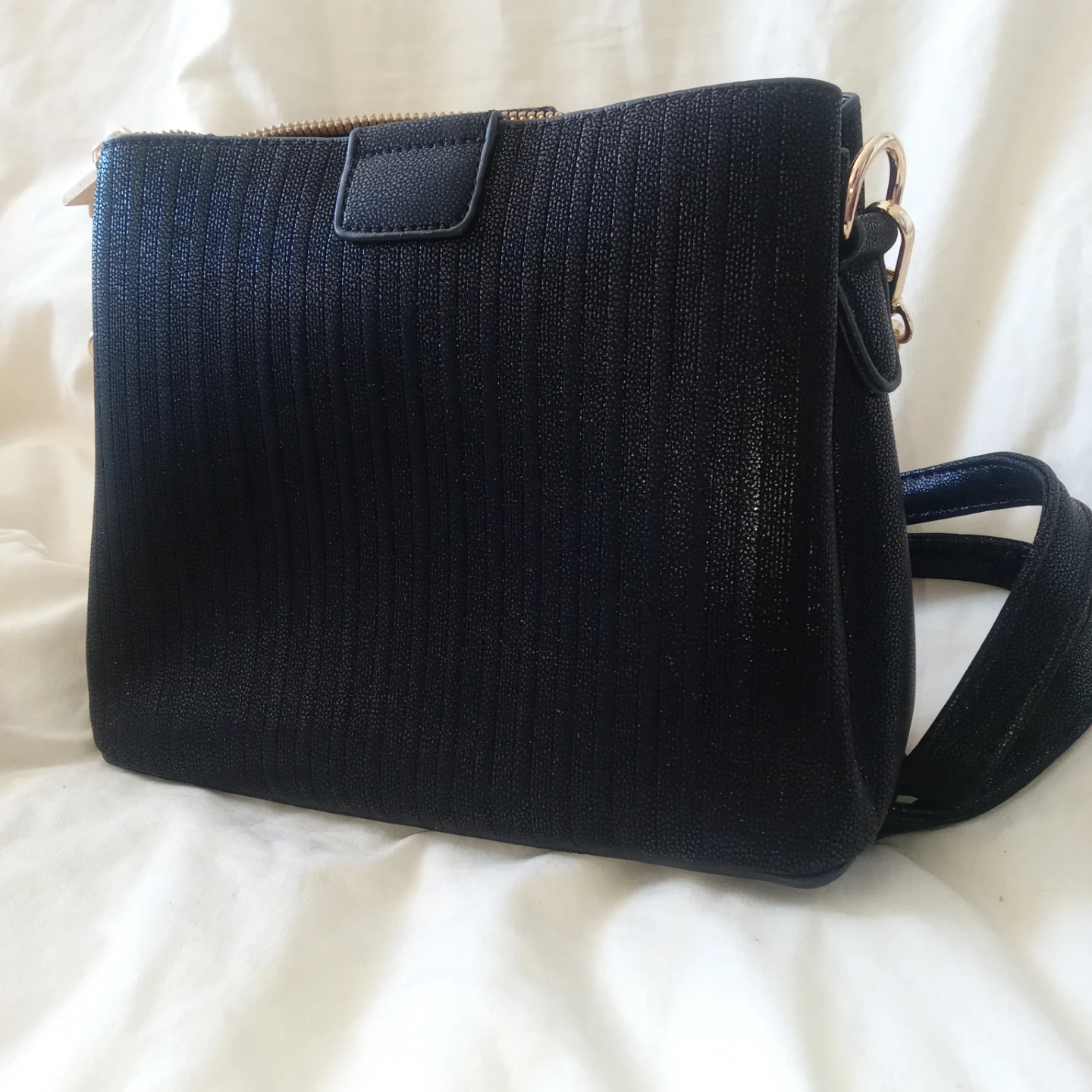 Black crossbody bag with gold accents - photo 2