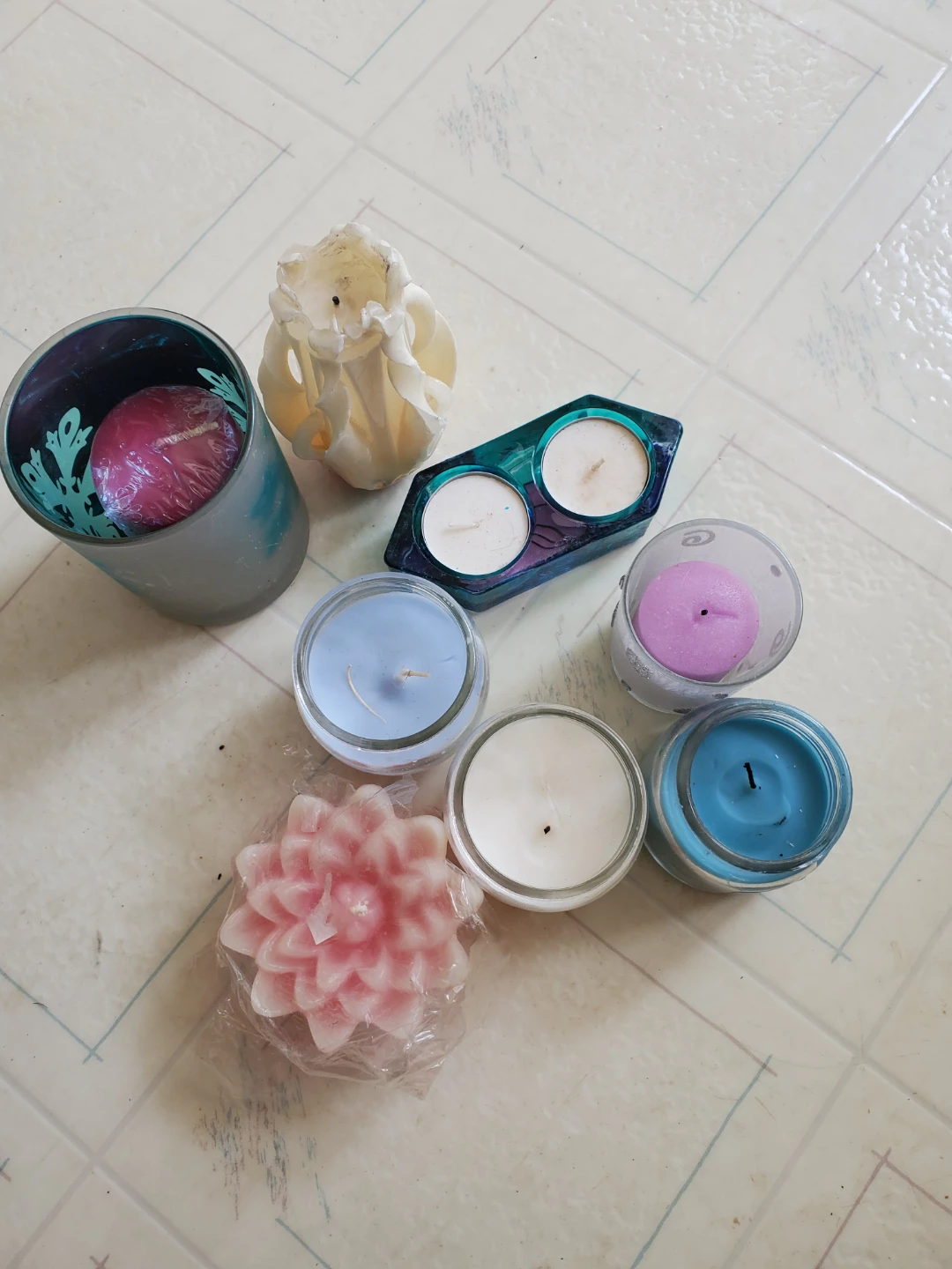 Assorted Scented Candles and Candle Holders