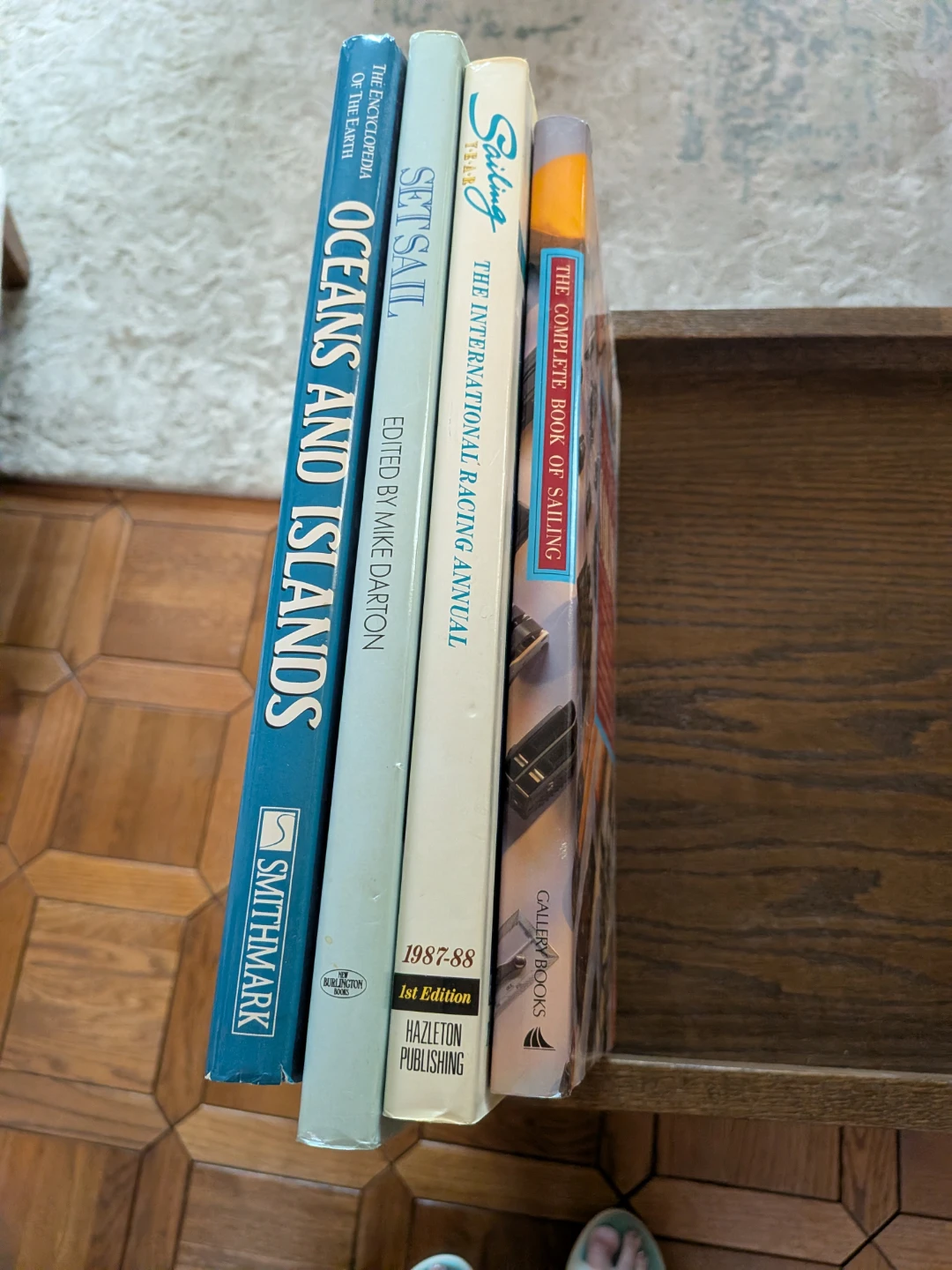 Collection of sea and sailing hard cover books