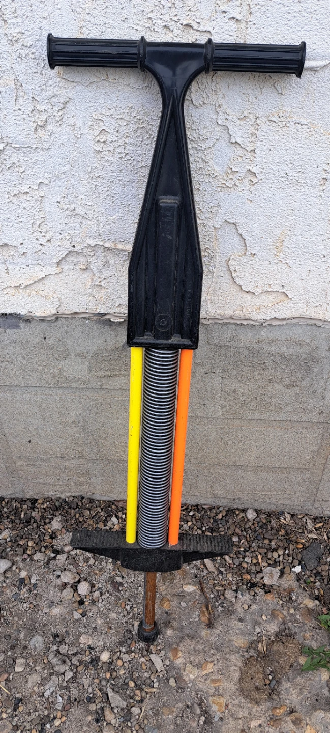Black Pogo Stick with Yellow and Orange Accents - photo 2