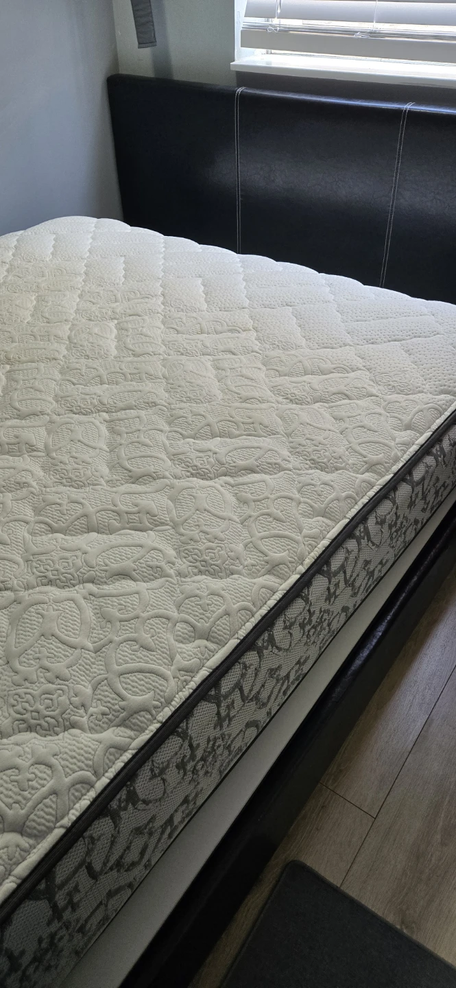 Queen size bed and white mattress on sale