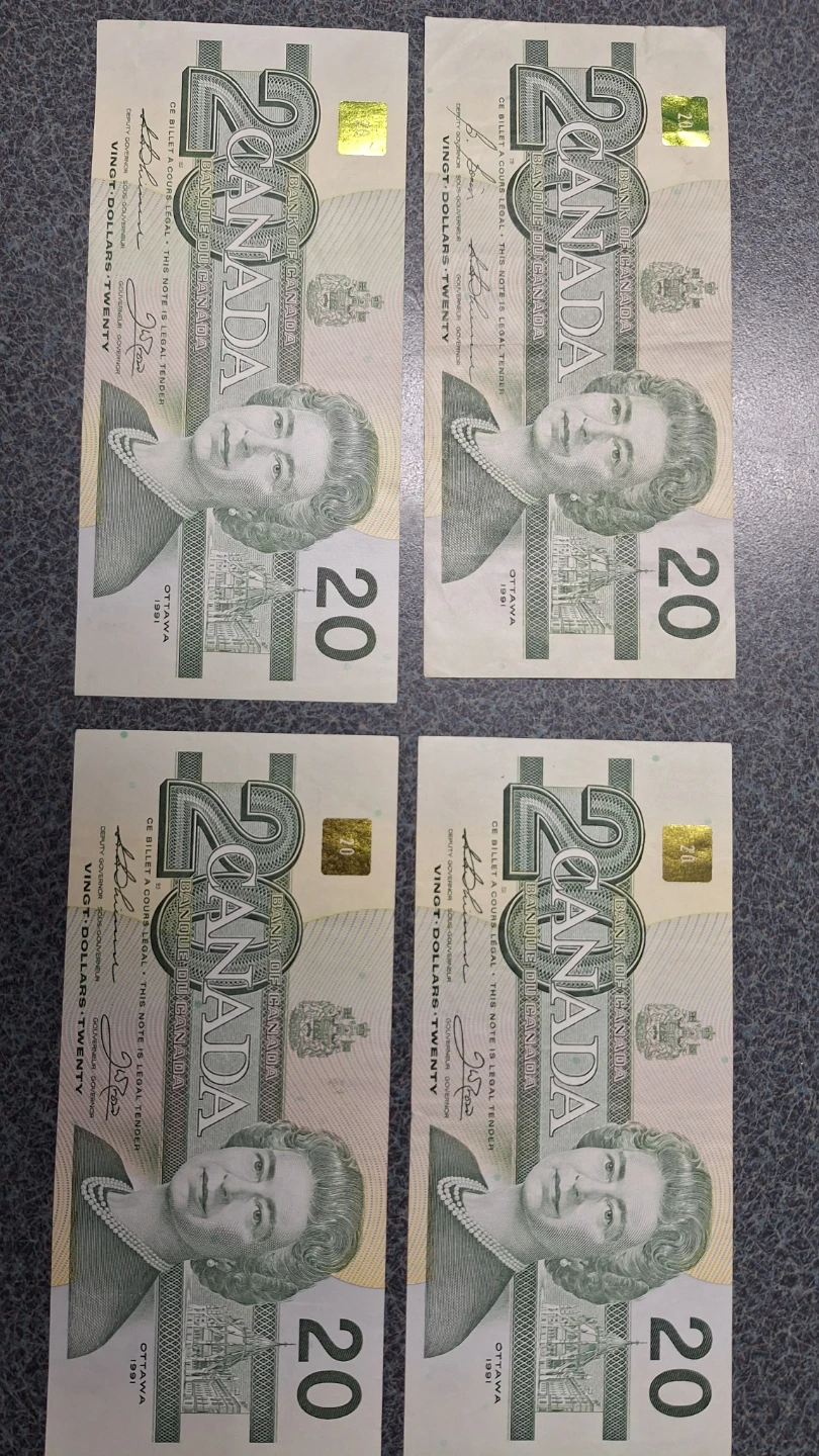 Four Canadian $20 Bills