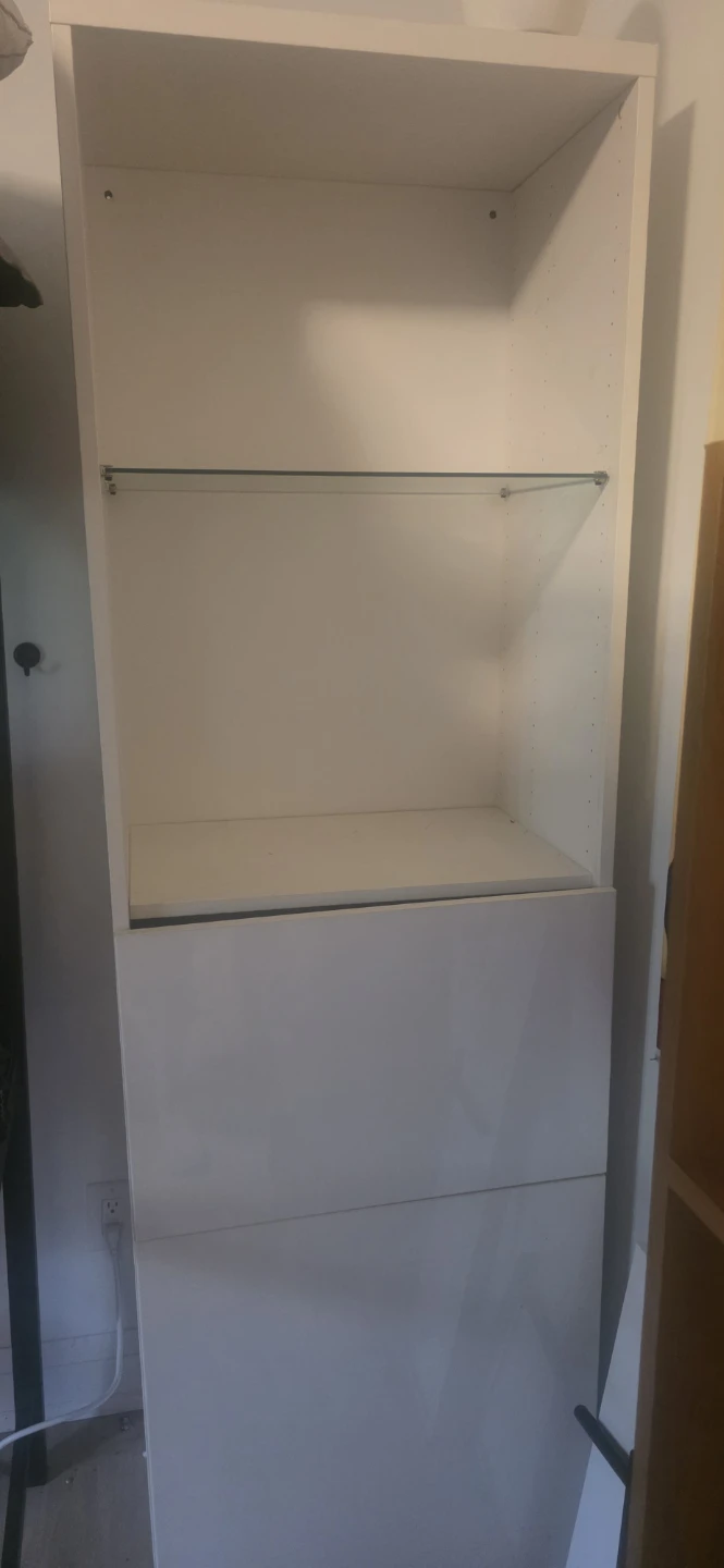 White bookshelf with glass shelf