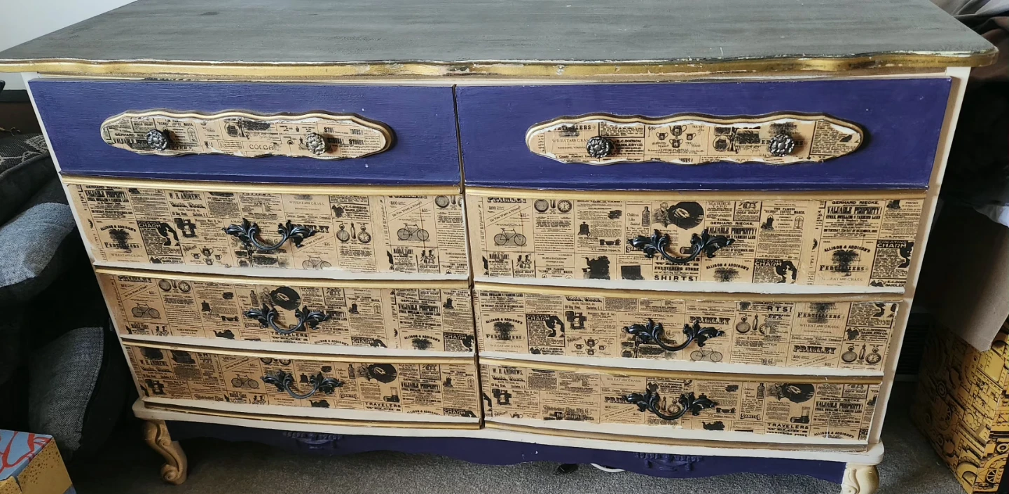 Unique Dresser with Newspaper Print
