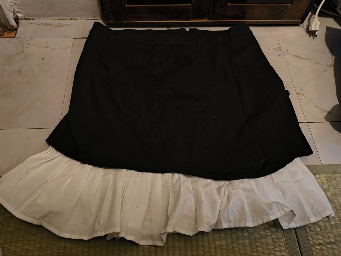 Black skirt with white ruffle bottom