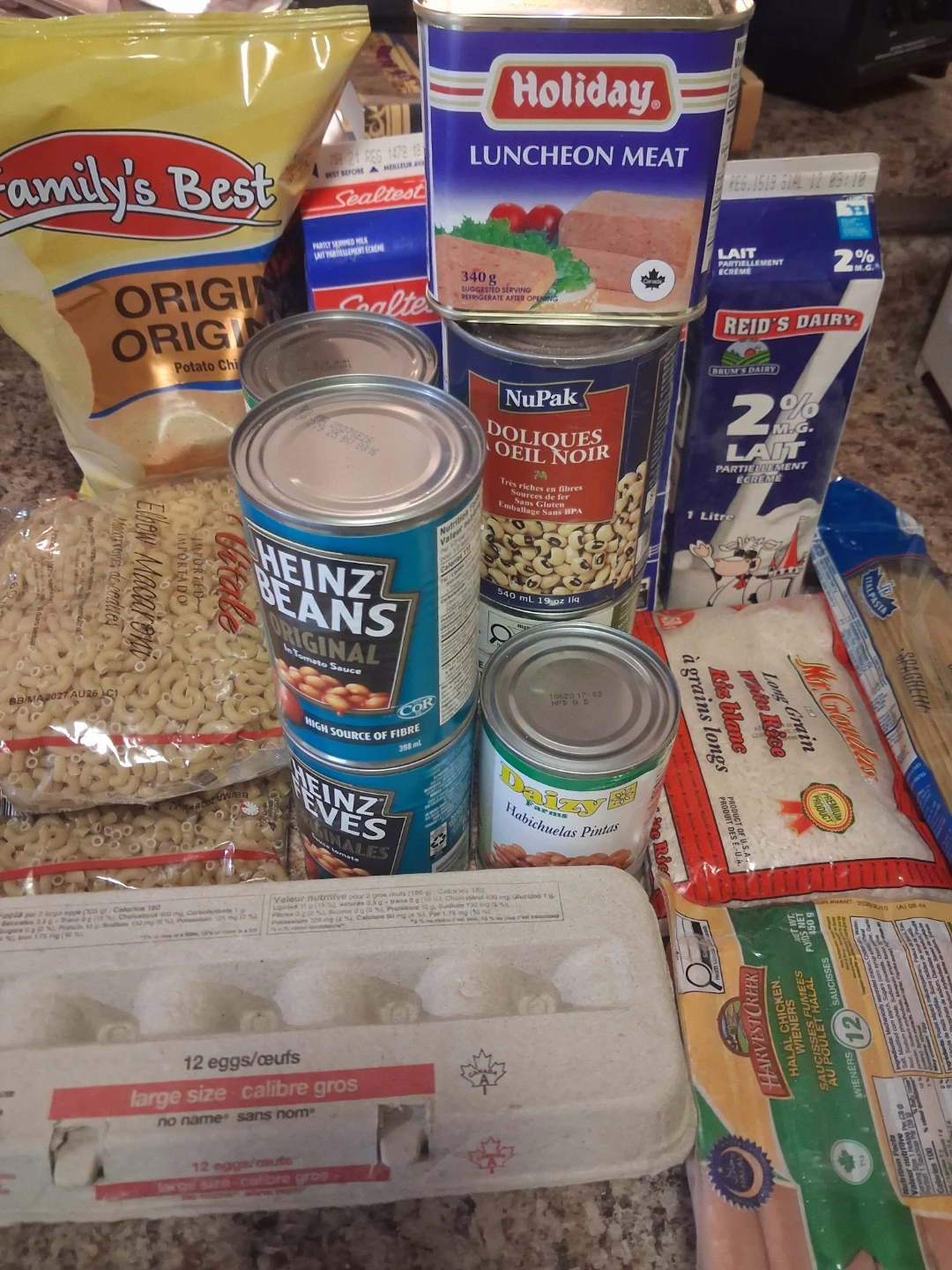 Assorted Groceries: Rice, Pasta, Beans, Meat, Eggs, Potatoes