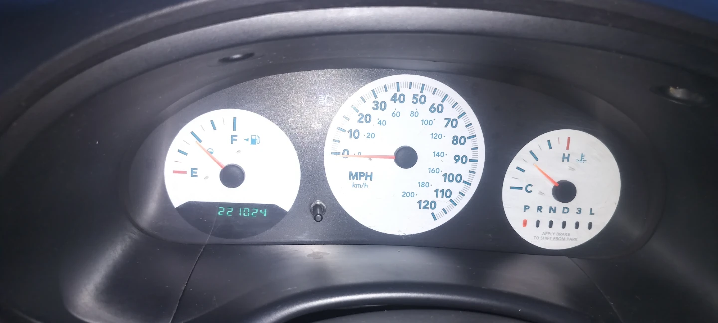 Silver Dodge Grand Caravan Minivan