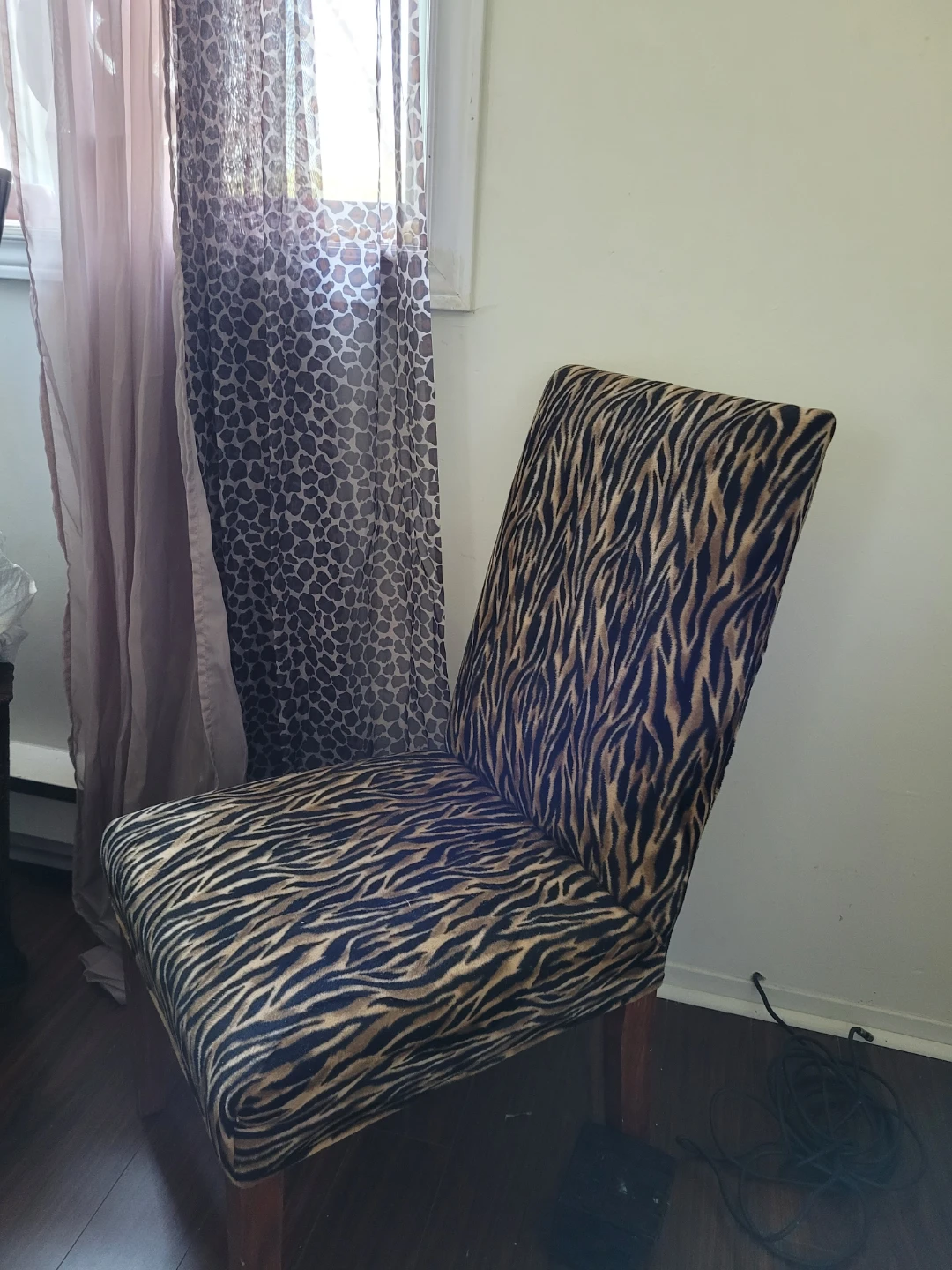 Zebra print accent chair and window sheers