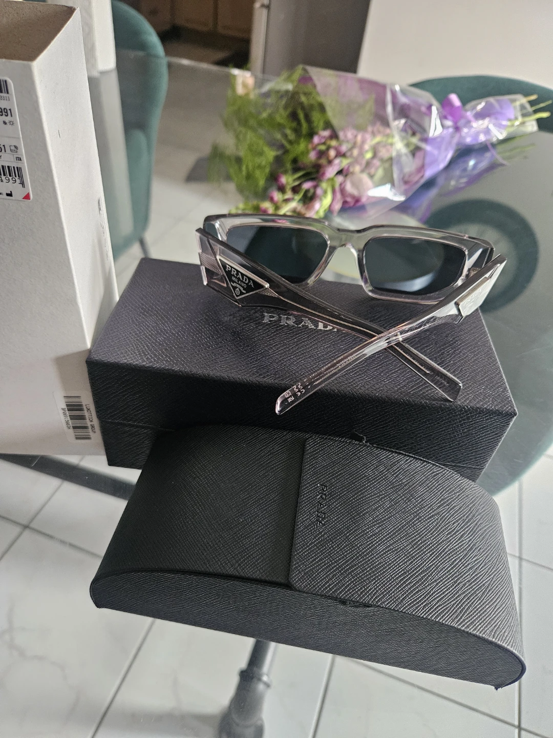 Prada Sunglasses OPR 09ZS Transparent Asphalt