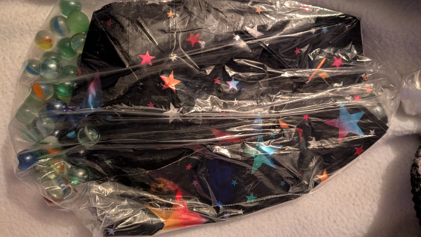 Bag of Marbles with Star Pattern Pouch