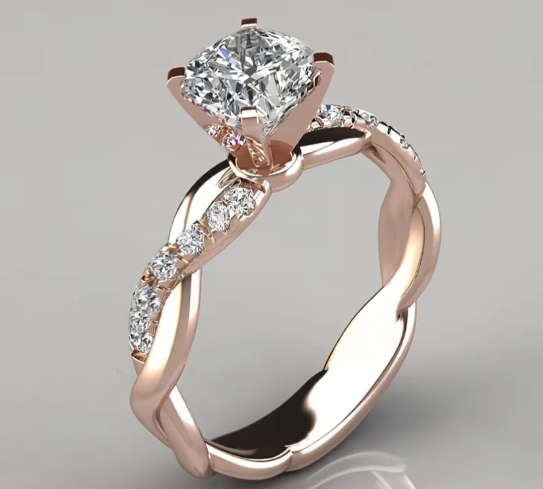 Rose Golden Four Prong Round Cubic Zirconia Ring