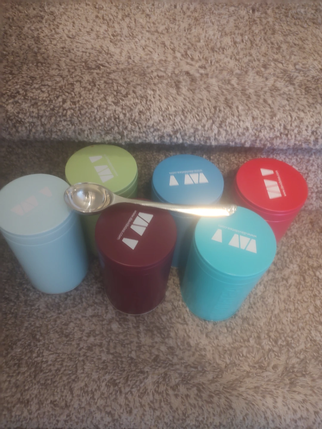 6 David's Tea Cans with 1 silver Spoon
