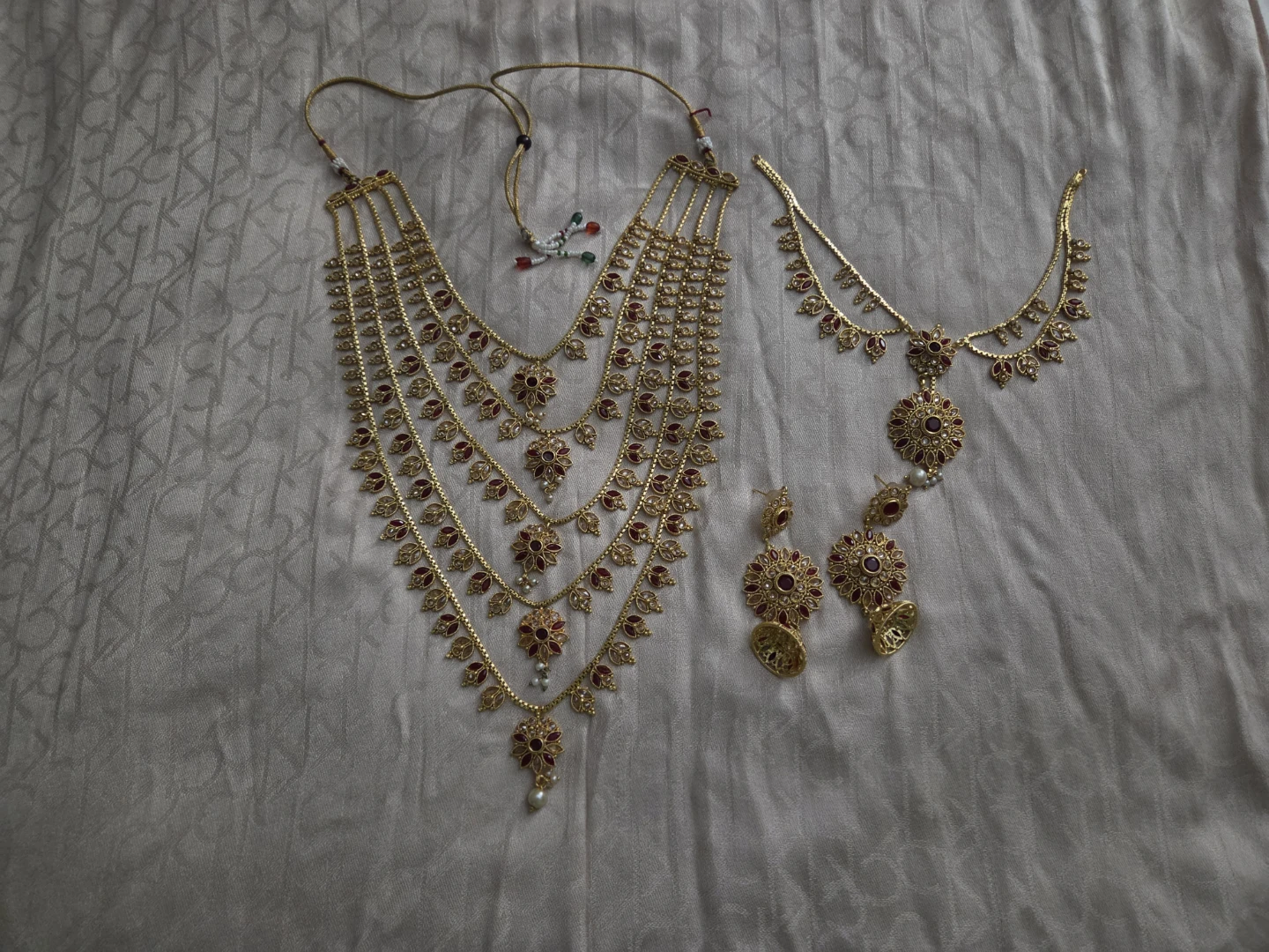 Gold-toned multi-layer necklace and earring set with red stones - photo 2
