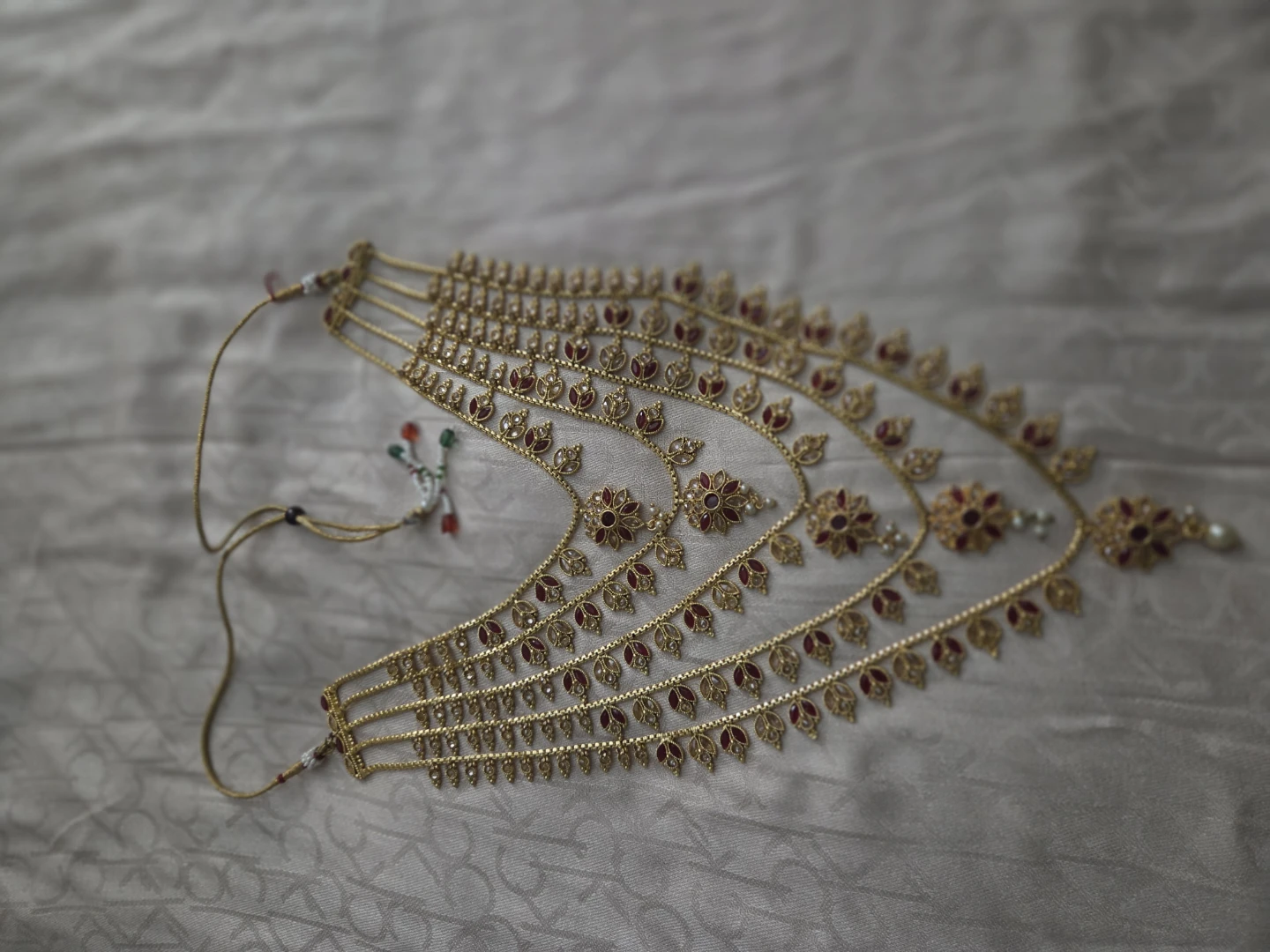 Gold-toned multi-layer necklace and earring set with red stones - photo 3