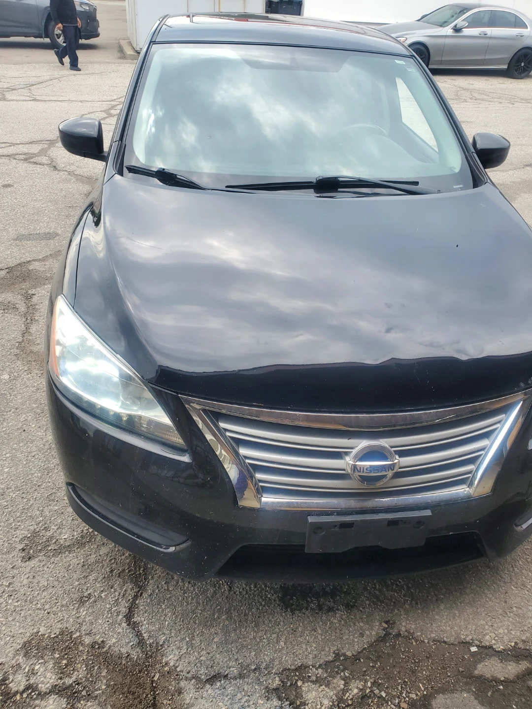 Black Nissan Sentra SV Sedan