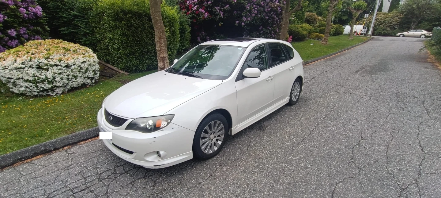 White Subaru Impreza 2010 2.5 i4