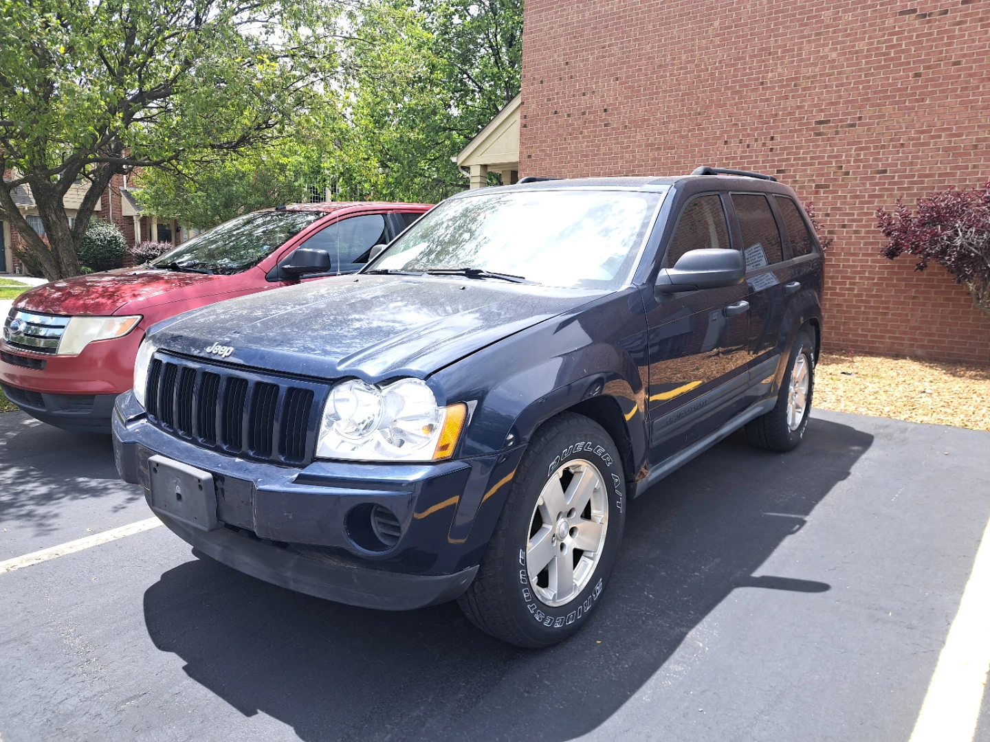 Blue Jeep Grand Cherokee SUV - photo 4