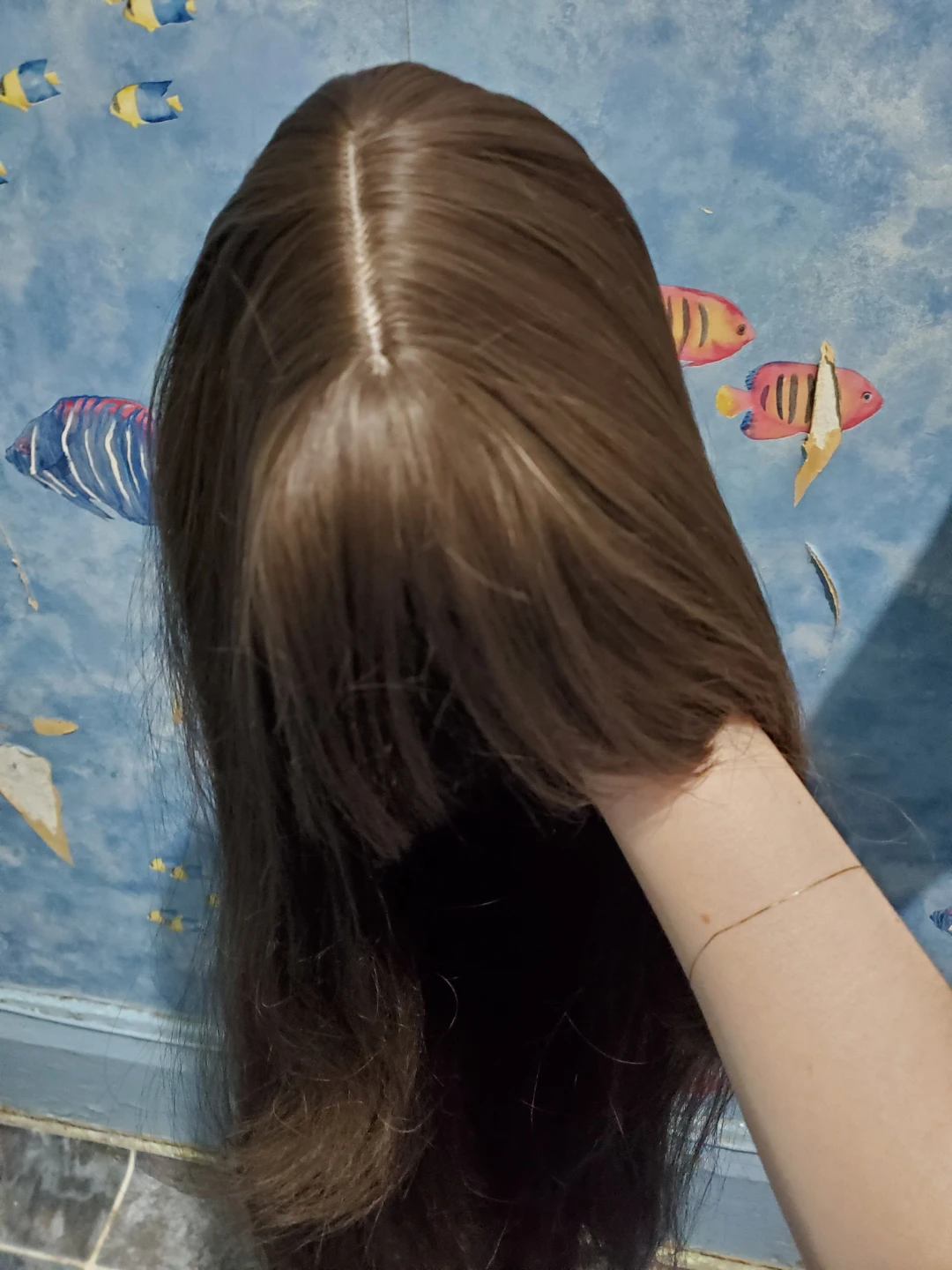 Medium-dark brown synthetic wig with fringe