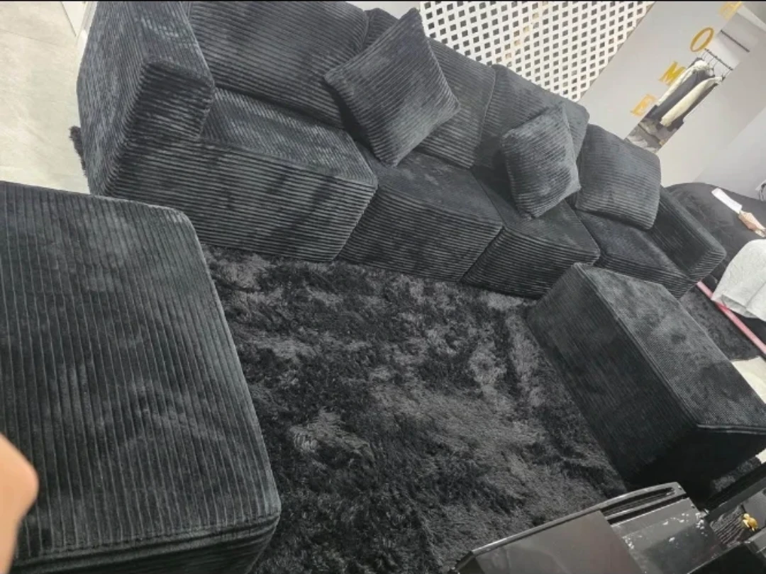 Black Corduroy Sectional Sofa with Ottoman and Rug