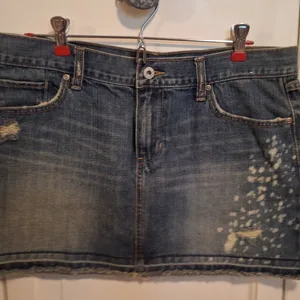 Denim Mini Skirt with Distressed Detail