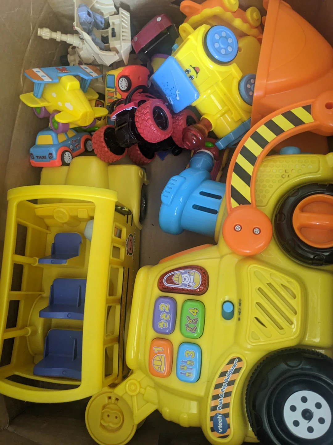 VTech Push & Pop Bulldozer and other toy vehicles