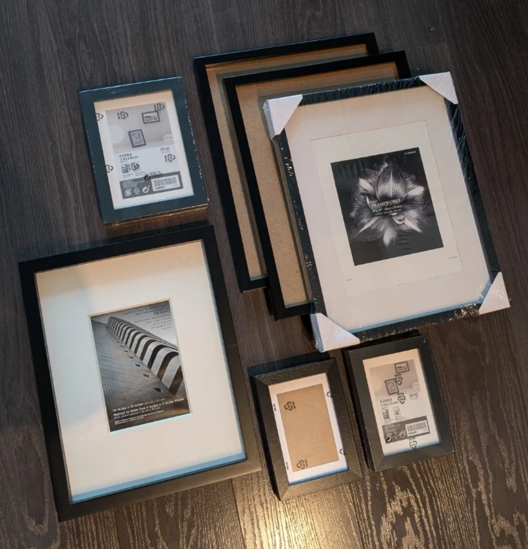 Lot of assorted black Picture Frames (price includes all 7)