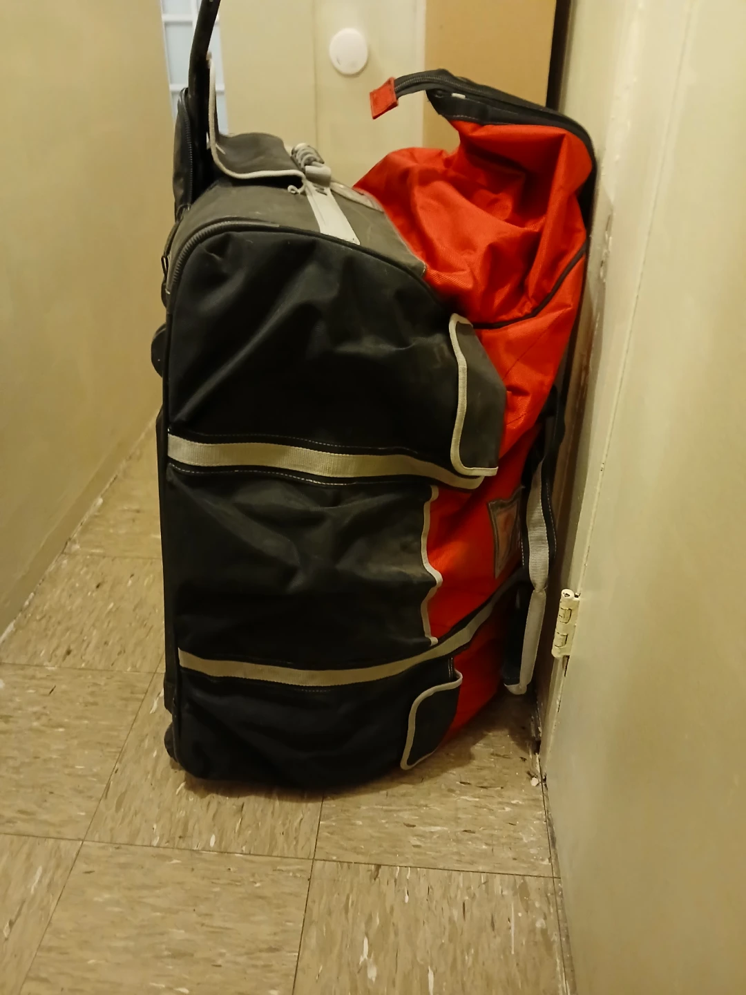 Husky Red and Black Rolling Duffel Bag