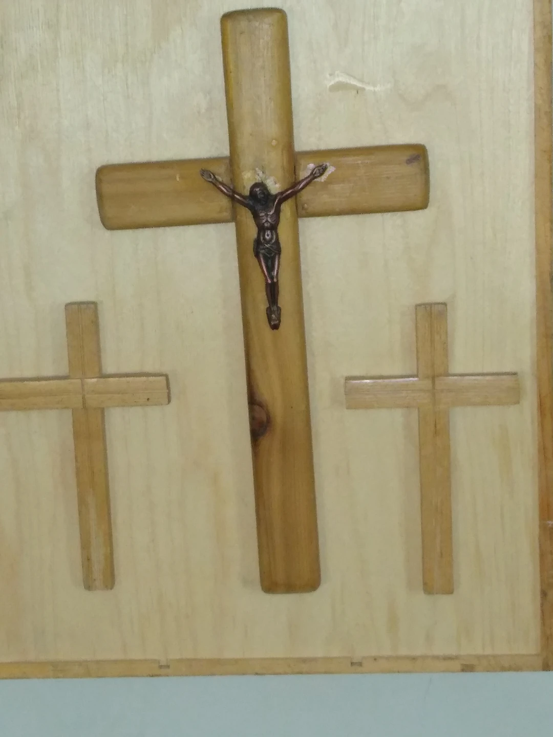 Hand carved three on Calvary memorial