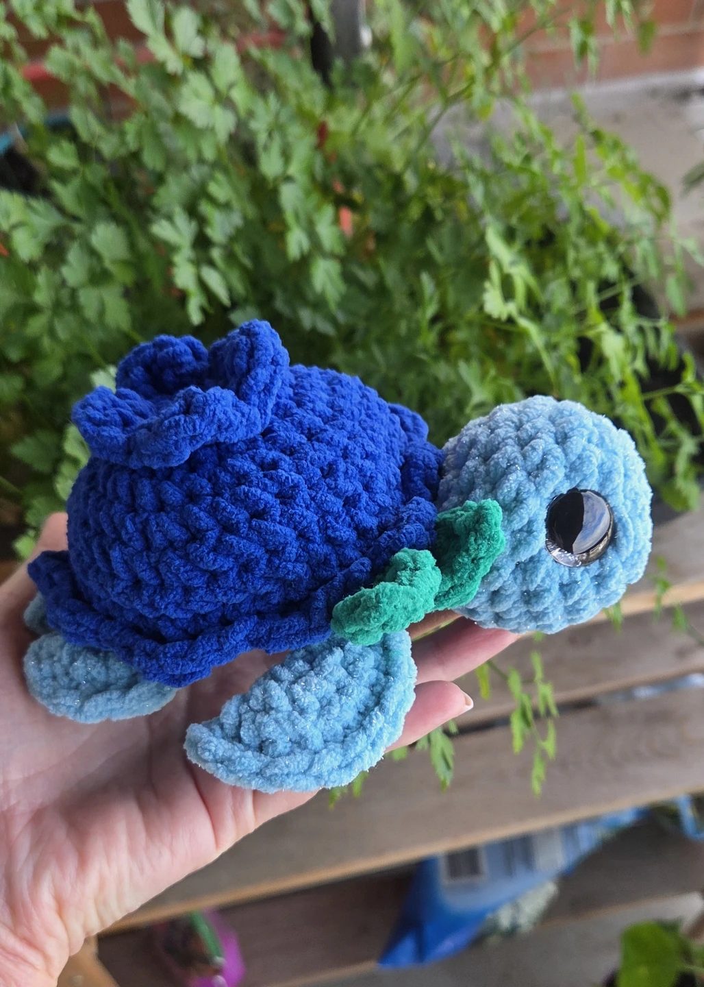 Crocheted blueberry-turtle plushie
