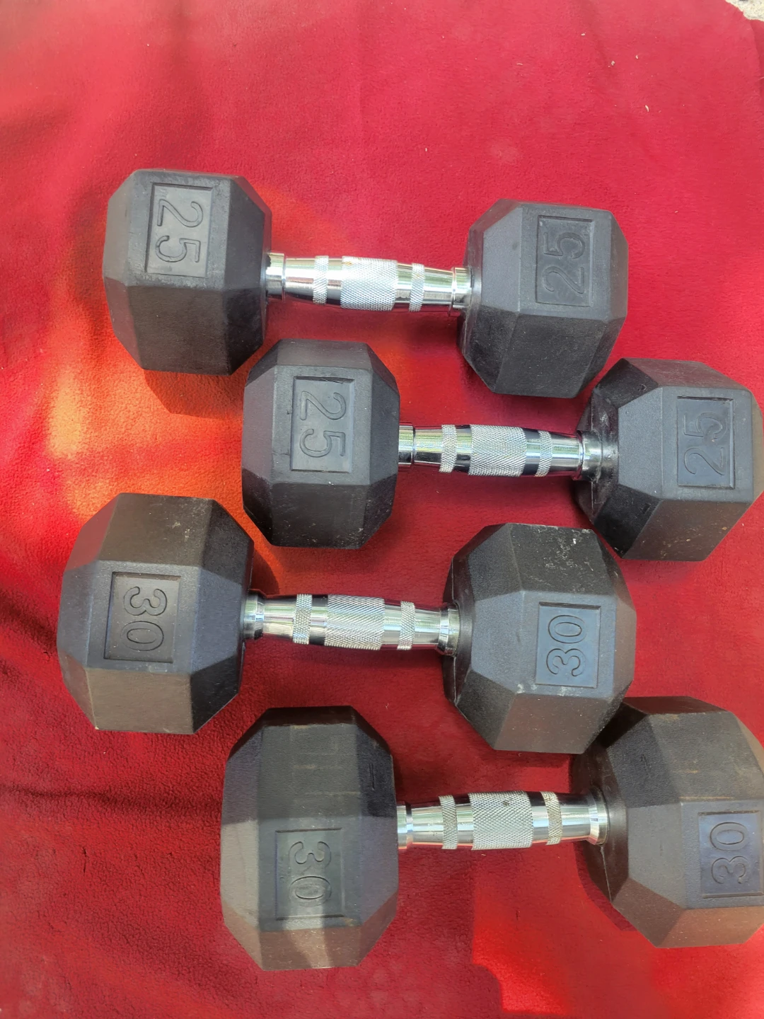 SETS OF 25s AND 30s  RUBBER COATED HEXHEAD DUMBBELLS