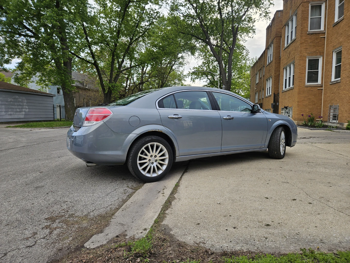 Blue Saturn Aura Sedan