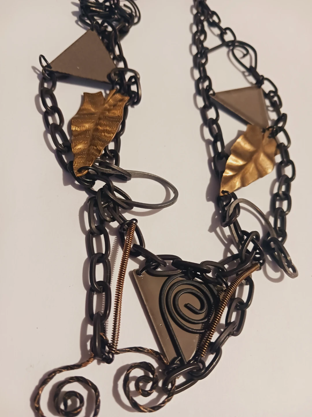 Unique Artsy Necklace with Geometric and Leaf Design