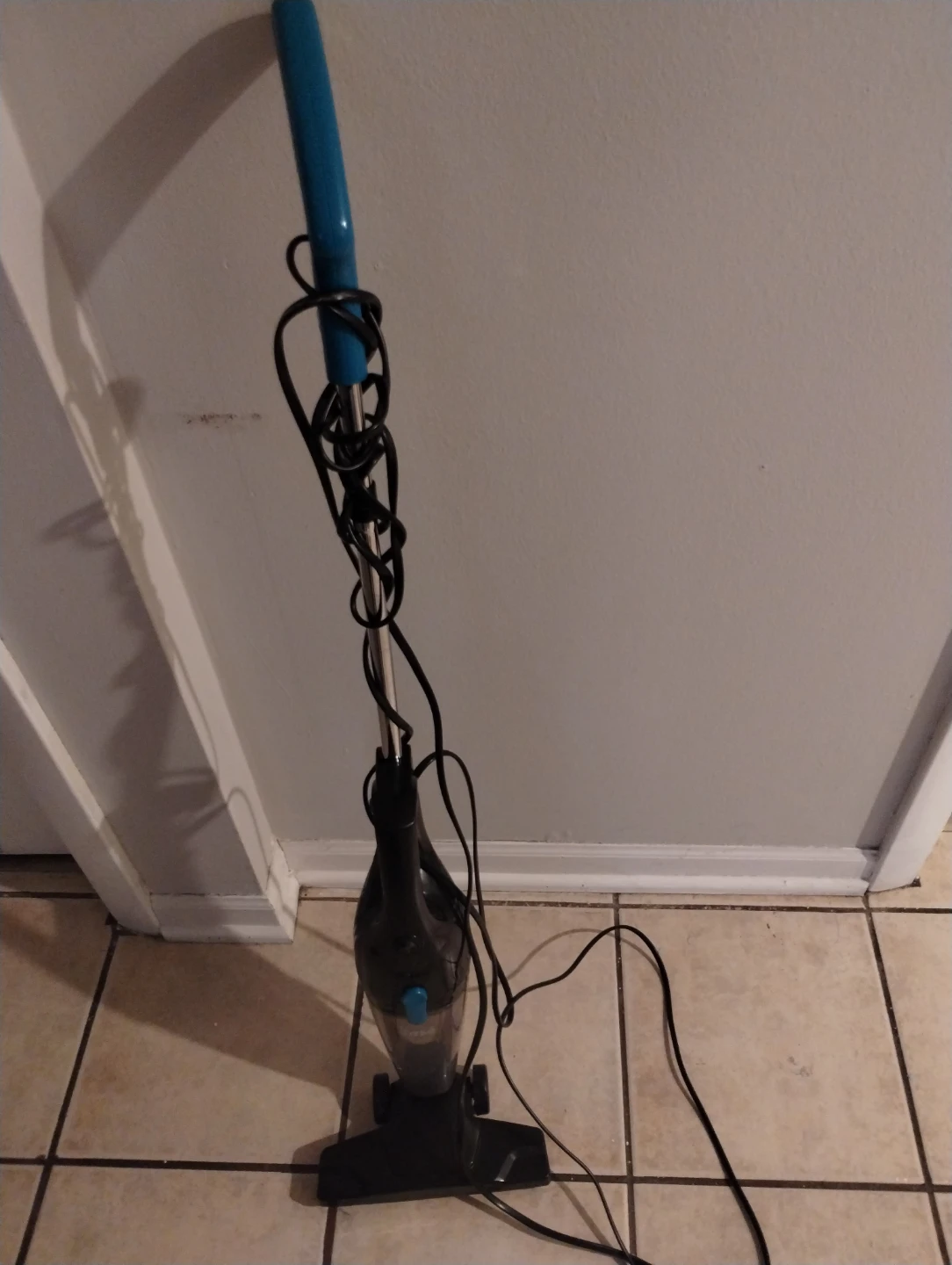Black Stick Vacuum Cleaner with Blue Handle