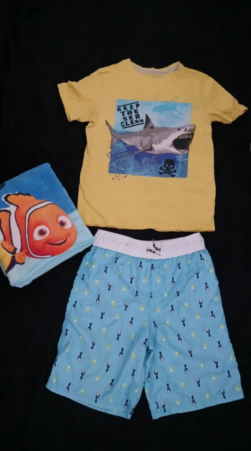 Kids' swim shorts, T-shirts, and towel