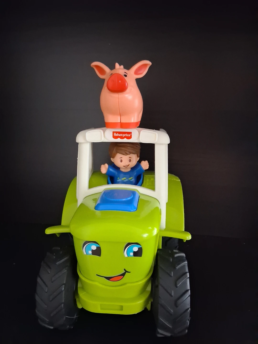 Fisher-Price Little People Pig Farmer Tractor Toy