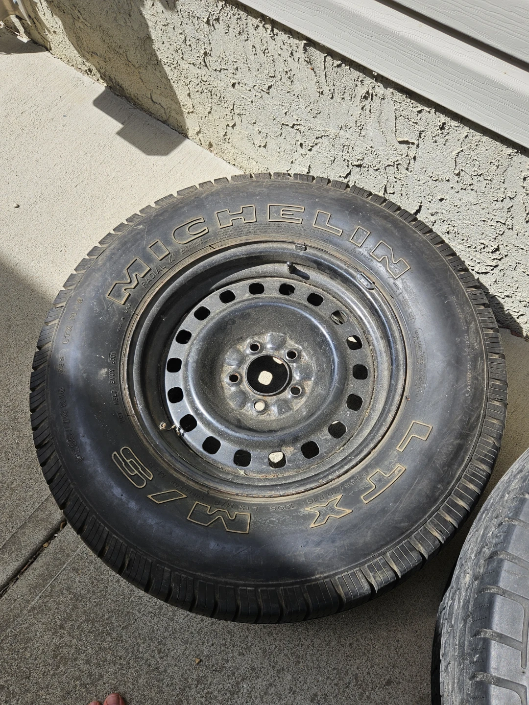 New Michelin LTX M/S Tire on original Ford Steel Rim 70R16 New
