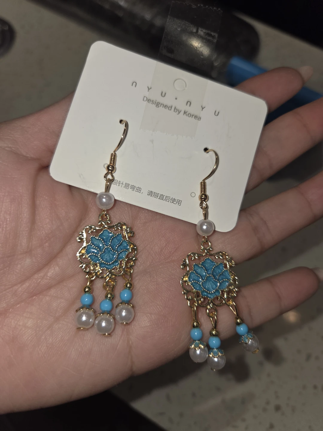 NYUNYU "Designed by Korea" Drop Earrings with Blue Flower
