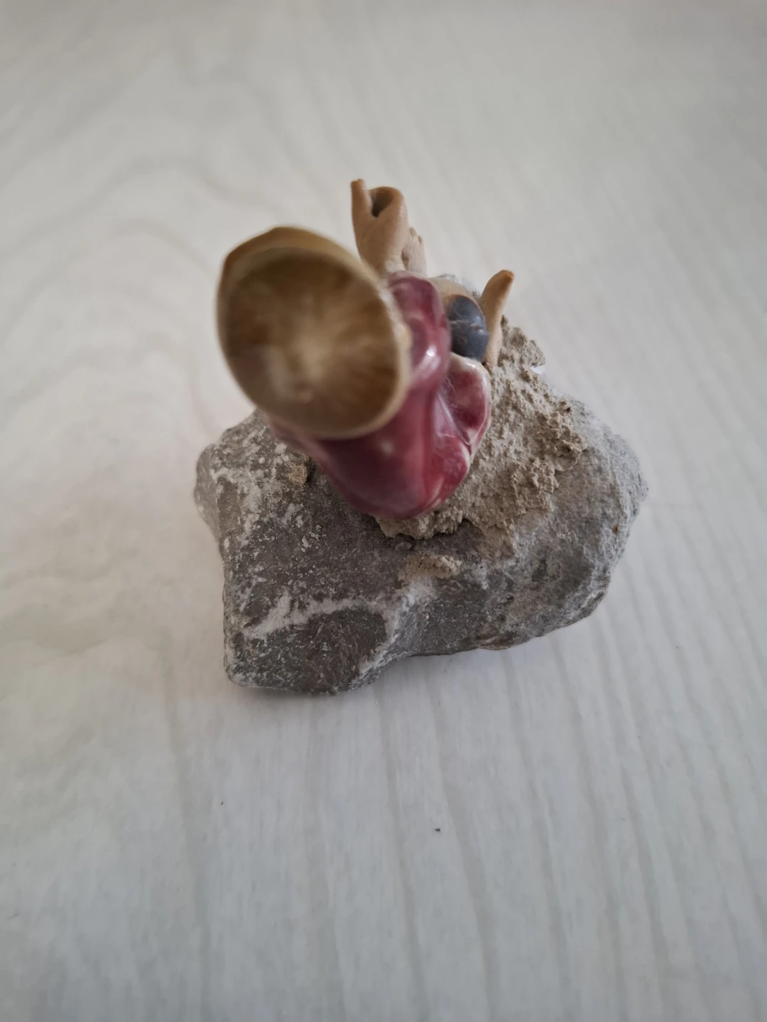 Ceramic Figurine of Man on Rock - photo 3