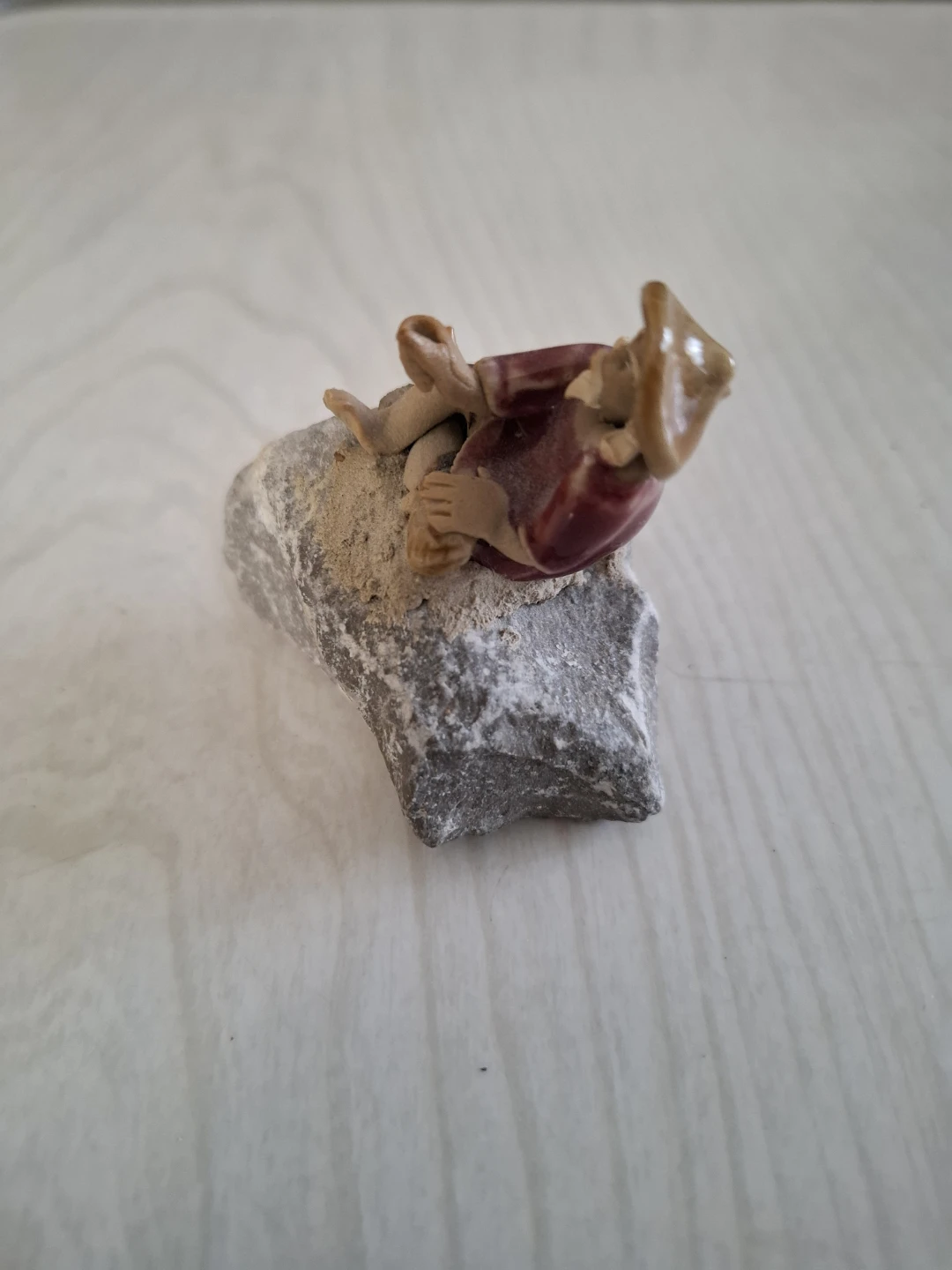 Ceramic Figurine of Man on Rock - photo 4
