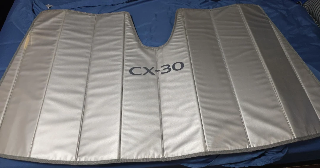 Silver Mazda CX-30 sun cover for protection.