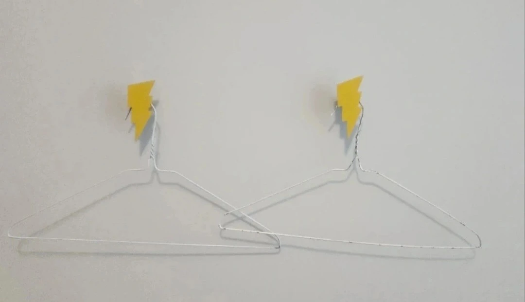 Two yellow lightning bolt hangers - photo 2
